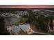 An aerial shot of a beautiful home and the surrounding community with a pond at 3894 Sawyers Island Dr, Mount Pleasant, SC 29466