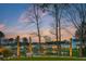 Scenic backyard view with serene pond and fence at 3894 Sawyers Island Dr, Mount Pleasant, SC 29466