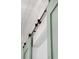Close-up of a light green barn door with bronze hardware adding rustic charm to the home's interior at 3894 Sawyers Island Dr, Mount Pleasant, SC 29466