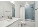 Updated bathroom features blue accent tiles and updated fixtures at 3894 Sawyers Island Dr, Mount Pleasant, SC 29466