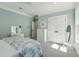 Well-lit bedroom with white furniture, including a vanity at 3894 Sawyers Island Dr, Mount Pleasant, SC 29466
