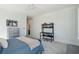 Bright bedroom featuring a work station, soft carpet, and blue bedding at 3894 Sawyers Island Dr, Mount Pleasant, SC 29466