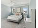 Bright bedroom with blue walls, fan, and a hanging chair at 3894 Sawyers Island Dr, Mount Pleasant, SC 29466
