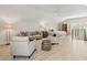 Cozy bedroom with light-colored wood flooring, neutral decor, and a comfortable seating area at 3894 Sawyers Island Dr, Mount Pleasant, SC 29466