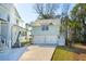 Detached two-car garage with basketball hoop, offering ample parking and storage space in a stylish design at 3894 Sawyers Island Dr, Mount Pleasant, SC 29466