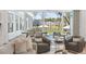 Comfortable living room featuring beautiful outdoor views overlooking a swimming pool and patio at 3894 Sawyers Island Dr, Mount Pleasant, SC 29466
