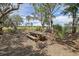 Park picnic area with a wooden table surrounded by trees and shady areas at 3894 Sawyers Island Dr, Mount Pleasant, SC 29466
