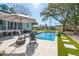 Stunning backyard pool with patio, lounge chairs, and a lush green lawn for outdoor enjoyment at 3894 Sawyers Island Dr, Mount Pleasant, SC 29466