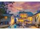 Backyard features a beautiful pool, lounge chairs, grilling area and covered patio at 3894 Sawyers Island Dr, Mount Pleasant, SC 29466