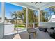 Covered porch featuring outdoor seating, golf greens, and water views at 3894 Sawyers Island Dr, Mount Pleasant, SC 29466