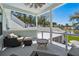 Relaxing outdoor porch with comfortable seating and scenic views of the lake and surrounding trees at 3894 Sawyers Island Dr, Mount Pleasant, SC 29466