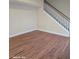 Bright living room with beautiful hardwood floors and staircase at 399 Stefan Dr, Charleston, SC 29412