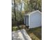 Outbuilding with a backyard fence, concrete patio, and grill at 399 Stefan Dr, Charleston, SC 29412