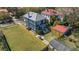 Attractive two-story home with a fenced yard and landscaped beds, ideal for Gathering time and gardening at 4 Kenilworth Ave, Charleston, SC 29403
