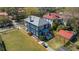 Beautiful two-story home with a fenced yard and patio area, perfect for outdoor living and entertaining at 4 Kenilworth Ave, Charleston, SC 29403