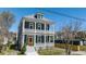 Charming two-story home features a classic porch, manicured lawn, and inviting curb appeal at 4 Kenilworth Ave, Charleston, SC 29403