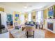 Bright living room features a cozy fireplace, modern decor, and an open layout at 4 Kenilworth Ave, Charleston, SC 29403