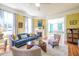 Bright living room features a cozy fireplace, modern decor, and an open layout at 4 Kenilworth Ave, Charleston, SC 29403