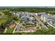 Community aerial featuring lush landscaping, central park, elegant condos, and convenient parking at 400 Bucksley Ln # 103, Charleston, SC 29492