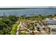 Aerial view of the community, showcasing a park, luxury condos, boat docks, and serene waterfront ambiance at 400 Bucksley Ln # 103, Charleston, SC 29492