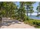 Relaxing path with bench in a beautifully landscaped community at 400 Bucksley Ln # 103, Charleston, SC 29492