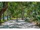Shaded walking path through a beautiful waterfront community at 400 Bucksley Ln # 103, Charleston, SC 29492