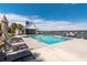 Community pool with lounge chairs and umbrellas, perfect for a relaxing day at 4021 Brown Trout Dr, Johns Island, SC 29455