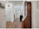 Hallway with hardwood floors, and dark wooden cabinet against the wall at 4021 Brown Trout Dr, Johns Island, SC 29455