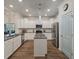Spacious kitchen with white cabinets, island, stainless steel appliances, and pantry at 4021 Brown Trout Dr, Johns Island, SC 29455