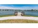 Scenic view of the lake pier, offering access for recreation and relaxation in this lakeside community at 4021 Brown Trout Dr, Johns Island, SC 29455