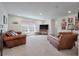Relaxing living room featuring comfortable seating and a large television, perfect for entertaining at 4021 Brown Trout Dr, Johns Island, SC 29455