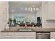 Kitchen bar with view to the living room with lots of light and hardwood floors at 4021 Brown Trout Dr, Johns Island, SC 29455