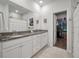 Spacious main bathroom with double vanity, granite countertops, and walk-in closet at 4021 Brown Trout Dr, Johns Island, SC 29455