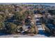 An aerial view of a neighborhood with tree lined streets and a variety of home styles at 412 Arlington Dr, Charleston, SC 29414