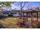 Spacious backyard featuring a gazebo and mature trees providing shade and creating a serene outdoor space at 412 Arlington Dr, Charleston, SC 29414