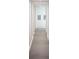 Hallway with hardwood floors leading to storage units and closets with ventilation at 412 Arlington Dr, Charleston, SC 29414