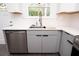 Kitchen sink with stainless steel features under a window, next to stainless steel dishwasher at 412 Arlington Dr, Charleston, SC 29414