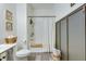 Well-lit bathroom featuring a tub/shower, toilet, and vanity with modern gray color accents at 429 Pender Woods Dr, Summerville, SC 29486