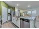 Modern kitchen with granite countertops, stainless steel appliances, and ample cabinet space at 429 Pender Woods Dr, Summerville, SC 29486