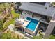 Spectacular aerial view of a luxurious home with a pool, lounge area, and meticulously landscaped surroundings at 430 Fish Tale Rd, Charleston, SC 29492