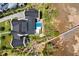 Stunning aerial view of an estate with a pool, golf course, and access to a beautiful river at 430 Fish Tale Rd, Charleston, SC 29492