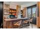 Basement bar features brick accents and ample seating for entertainment at 430 Fish Tale Rd, Charleston, SC 29492