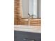 Close-up of a modern bathroom sink with a stylish faucet and a decorative mirror, showcasing elegant design details at 430 Fish Tale Rd, Charleston, SC 29492