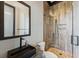 Modern bathroom featuring a stylish vanity, toilet, and walk-in shower with tasteful wood-look tile at 430 Fish Tale Rd, Charleston, SC 29492