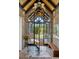 Grand foyer featuring high ceilings, an open doorway, and stylish decor, creating a welcoming ambiance at 430 Fish Tale Rd, Charleston, SC 29492