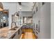 Spacious kitchen with gray cabinets, marble backsplash, countertop and stainless steel appliances at 430 Fish Tale Rd, Charleston, SC 29492