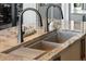 Close up of kitchen sink, faucet, and marble countertop at 430 Fish Tale Rd, Charleston, SC 29492