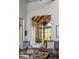 Bright living room showcasing a cozy sofa, modern decor, and a large window view, creating a comfortable space at 430 Fish Tale Rd, Charleston, SC 29492