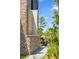 Cozy outdoor patio setup with dining and seating near a well-maintained brick wall at 430 Fish Tale Rd, Charleston, SC 29492