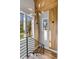 Staircase landing with lots of natural light and neighborhood views at 430 Fish Tale Rd, Charleston, SC 29492